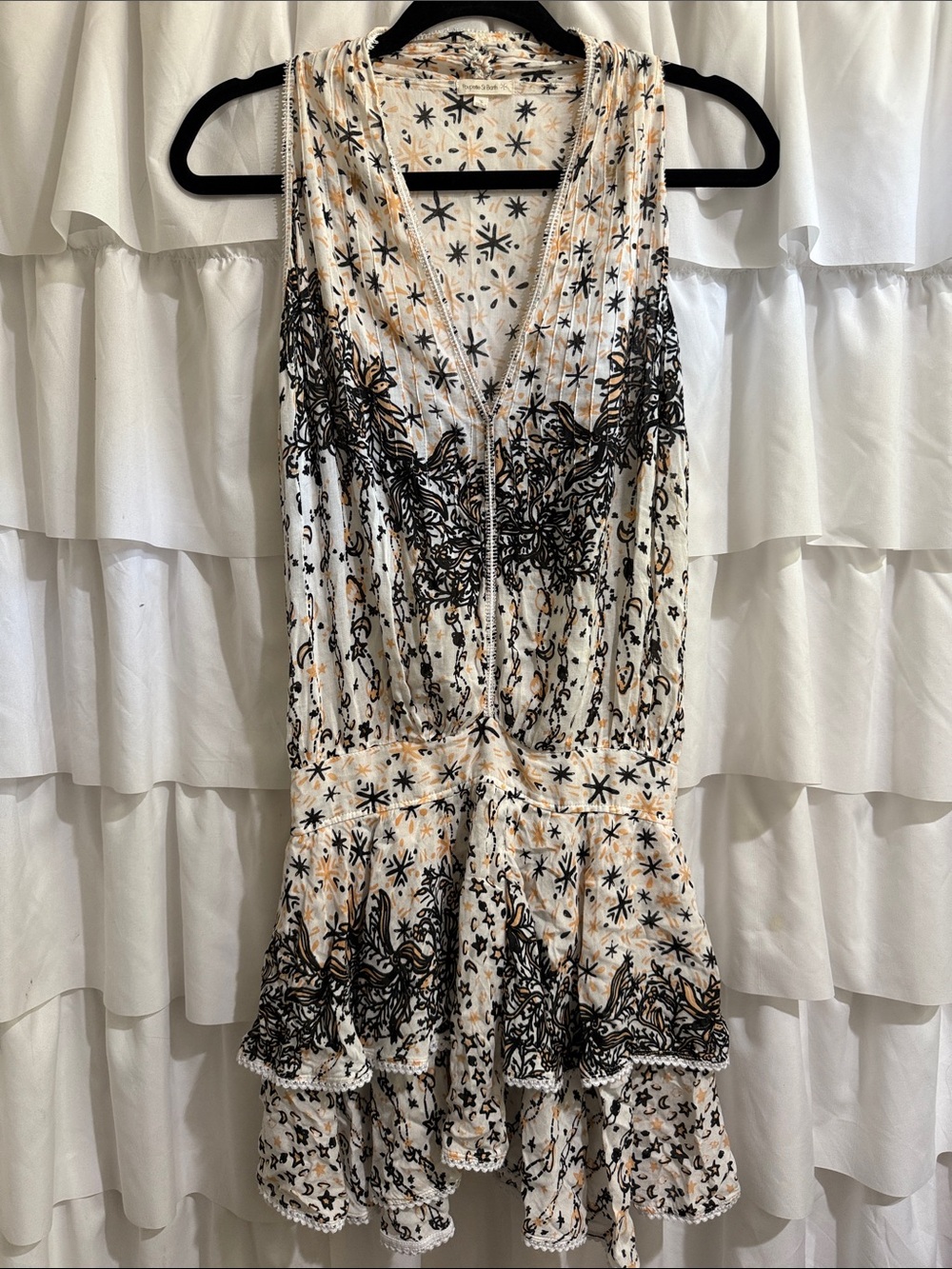 Poupette St. Barth White Mini Dress with Black & Tan Floral and star Print